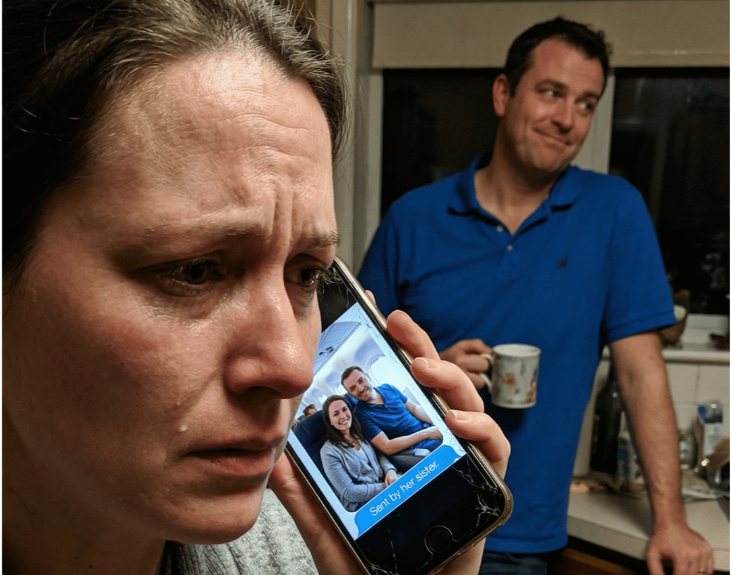 My sister, an airline pilot, called me. “I need to ask you something strange. Your husband… is he home right now?” “Yes,” I replied, “he’s sitting in the living room.” Her voice dropped to a whisper. “That can’t be true. Because I’m watching him with another woman right now. They just boarded my flight to Paris.” Just then, I heard the door open behind me…