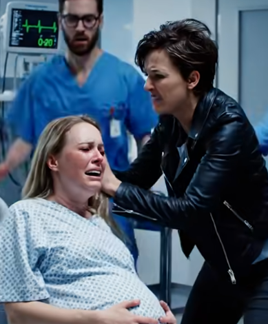 I was lying in a hospital bed, one hand on my pregnant belly, when the door slammed open and she hissed, “You really think carrying his child makes you untouchable?” My heart stopped as she yanked my hair and shoved me down. Nurses shouted, alarms blared—then my father walked in, eyes cold. “Get your hands off my daughter,” he said. She froze… if only she knew who he was.