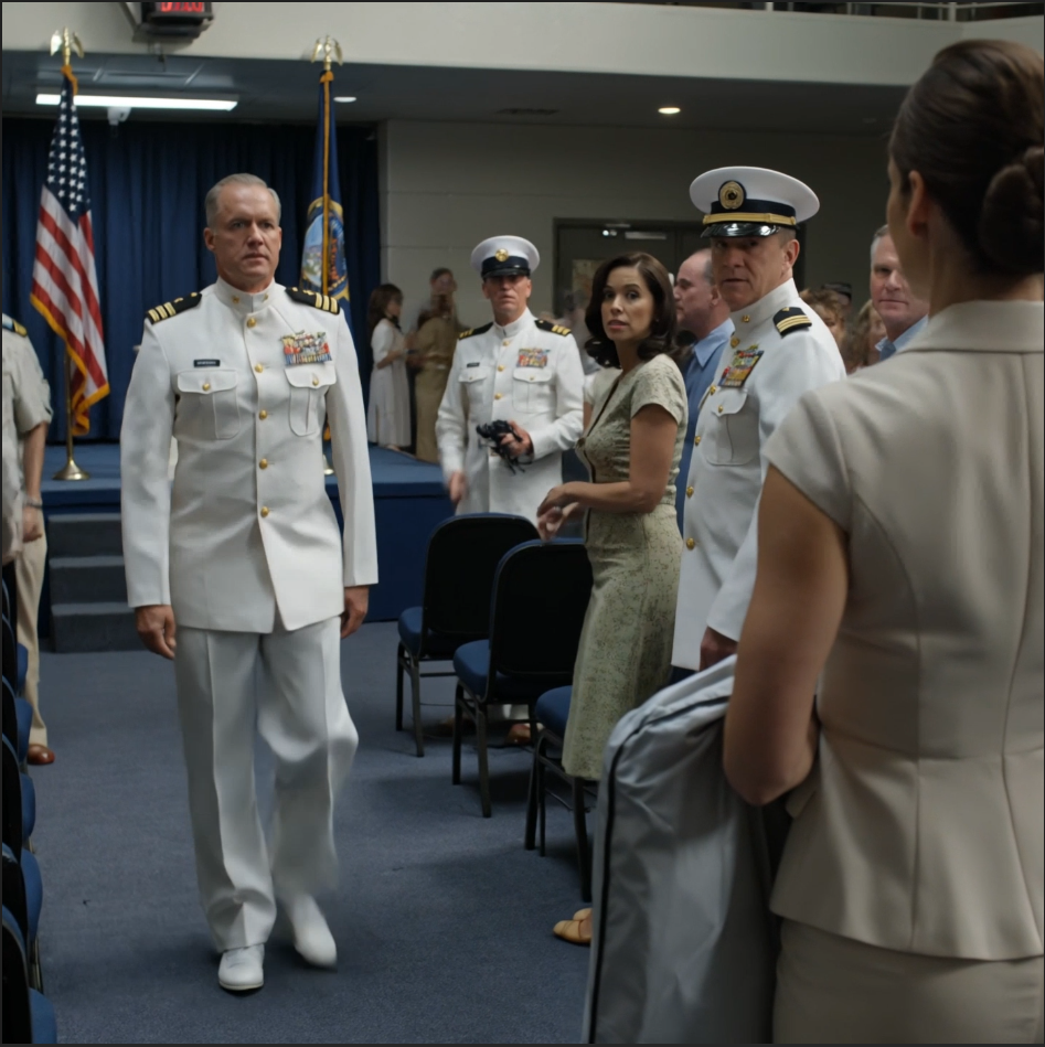 My parents erased me so carefully that no one noticed until I flew home for my sister’s Navy commissioning, got sent to the back row like an afterthought, watched her thank every Donovan in uniform except me, and then—right in the middle of the photo line—her commanding officer stopped, turned, looked straight at me, and said, “Ma’am”… and the entire room went still